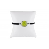 Black string bracelet with green stones inside circular disk 