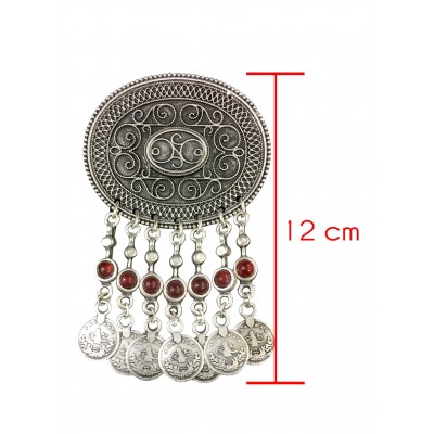 Bohemian style silver color vintage brooch of oval shaped metal and coins tassel and red solitaires