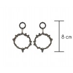 Two black rings with black solitaires Earrings 