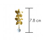 Two golden color flowers with solitaires and white pearl Earrings