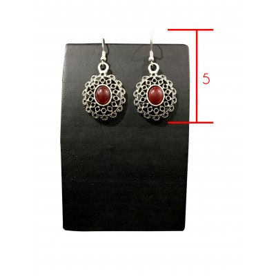 Bohemian style vintage oval shape earrings with red solitaire
