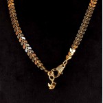 Golden color V-shaped pattern chain with tiny Tweet pendant Necklace.