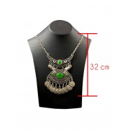 Bohemian style silver color vintage necklace with green solitaires and coin tassels