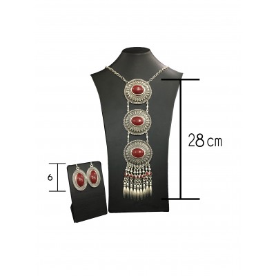 Bohemian style silver color set with vintage circular shapes and big red solitaires