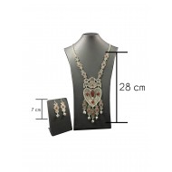 Bohemian style silver color set with vintage and heart shapes with fringes and small red solitaires